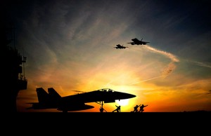 Military plane at sunset
